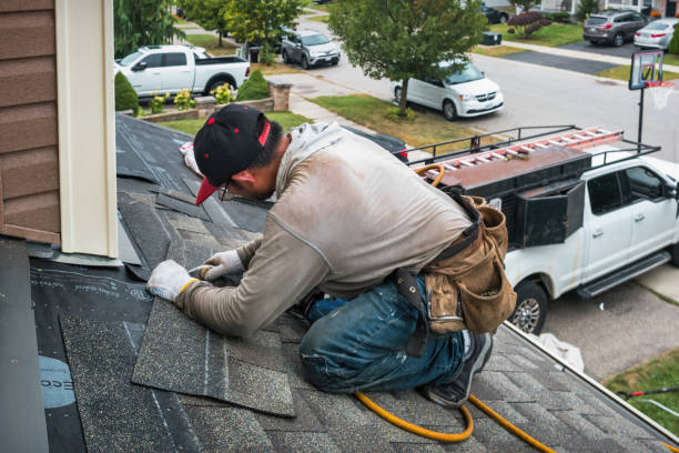 Professional Roofing technician working in Mercedes, TX